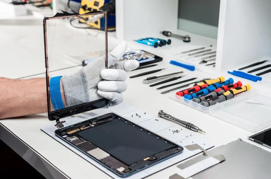 Technician working on a Samsung tablet repair
